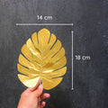 IMPODIO artificial monstera gold – Properti foto konten - dalam penggunaan