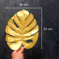 IMPODIO artificial monstera gold – Properti foto konten - background putih